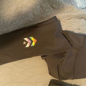 Lululemon Black Wunder Under with Barry’s Pride logo on back right leg